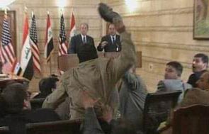 Muntadar al-Zaidi throwing shoe at George W. Bush