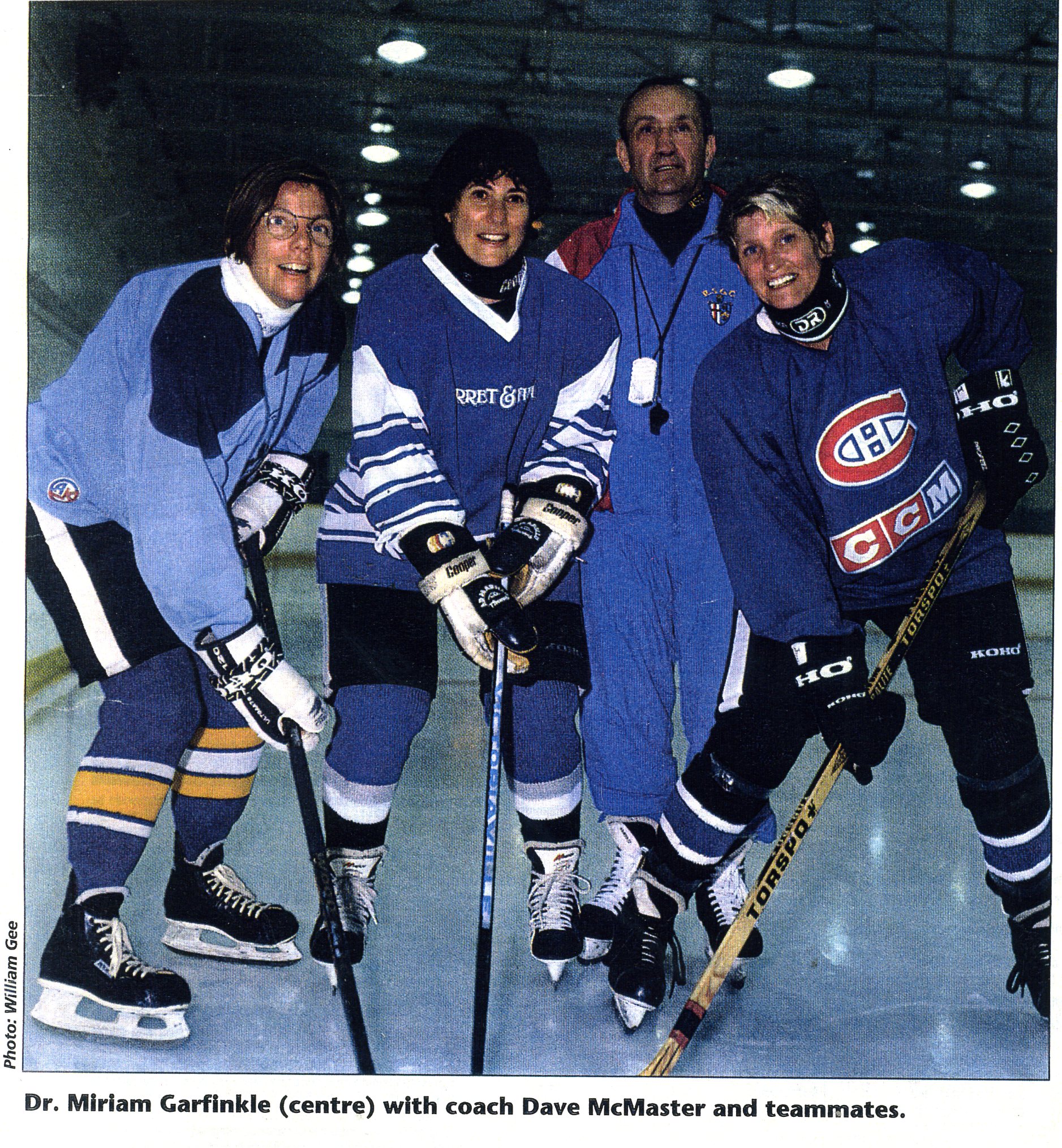 Dr. Miriam Garfinkle with coach Dave McMaster and teammates